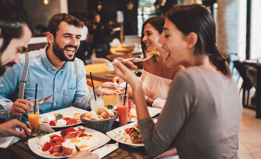 friends having breakfast in the restaurant